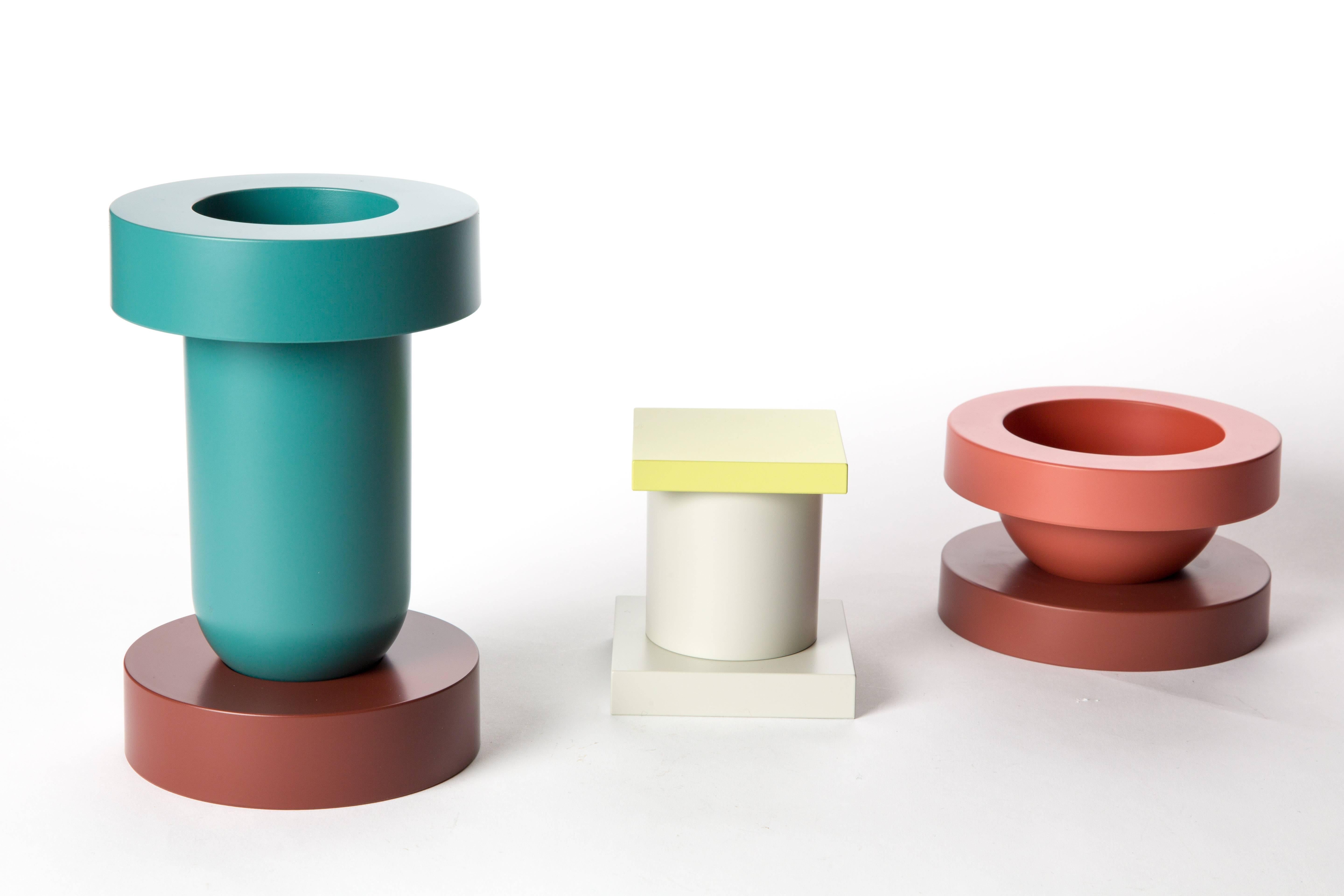 Sottsass Marutomi Japan. Sottsass designed this set for the Japanese company Marutomi. The objects are of painted plastic. They look like ceramic. They are painted with the Japanese Urushi lacquer method. A very old method with paint from the urushi