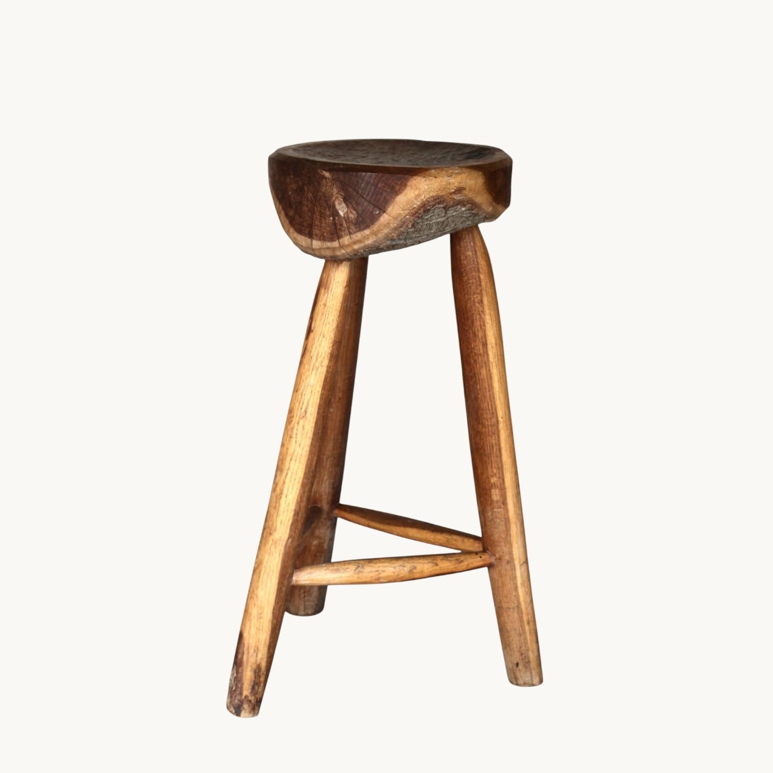 Wood A set of three stools, France 60s. For Sale