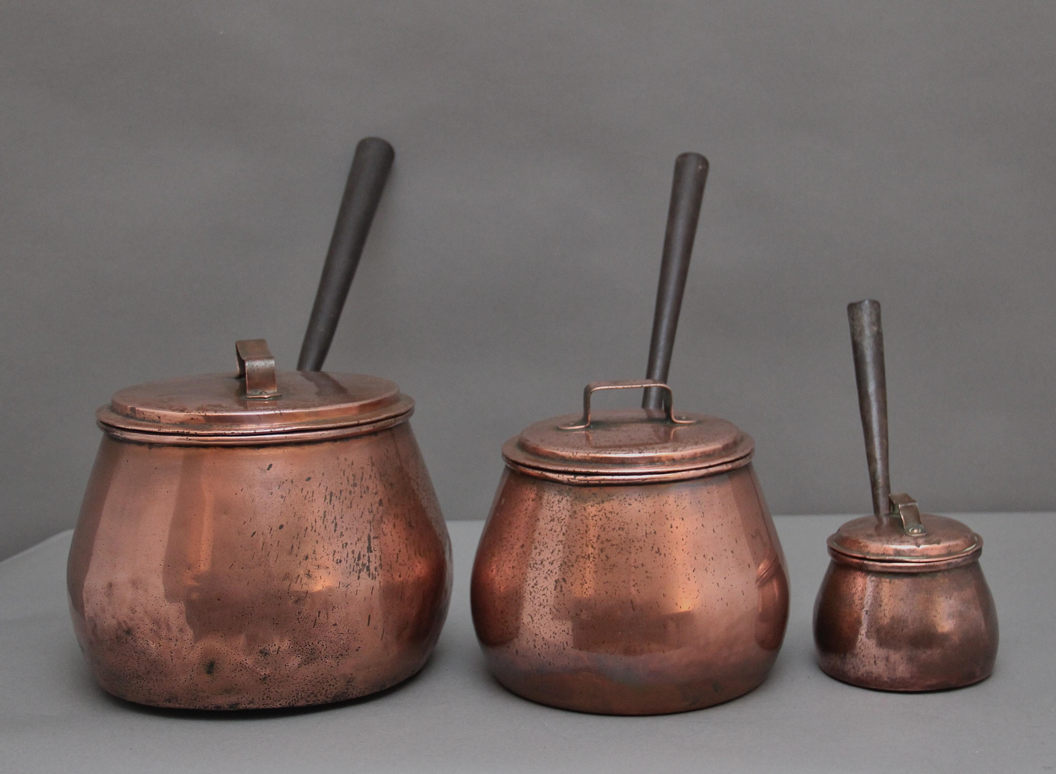 Mid-19th Century A set of three Victorian copper saucepans For Sale