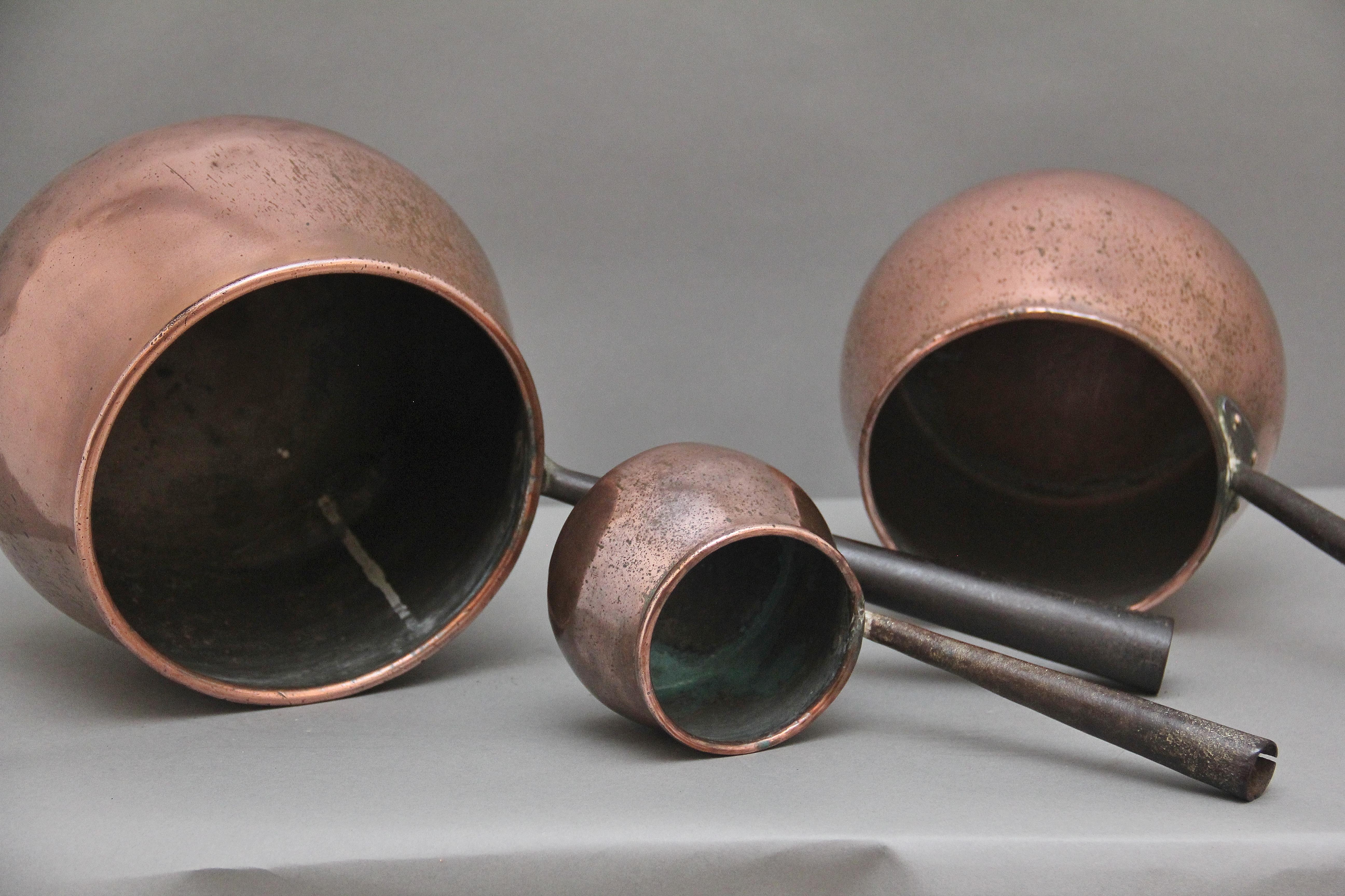A set of three Victorian copper saucepans For Sale 1