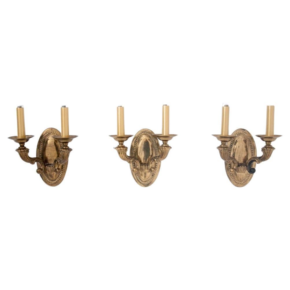 A set of three wall lamps, mid 20th century For Sale