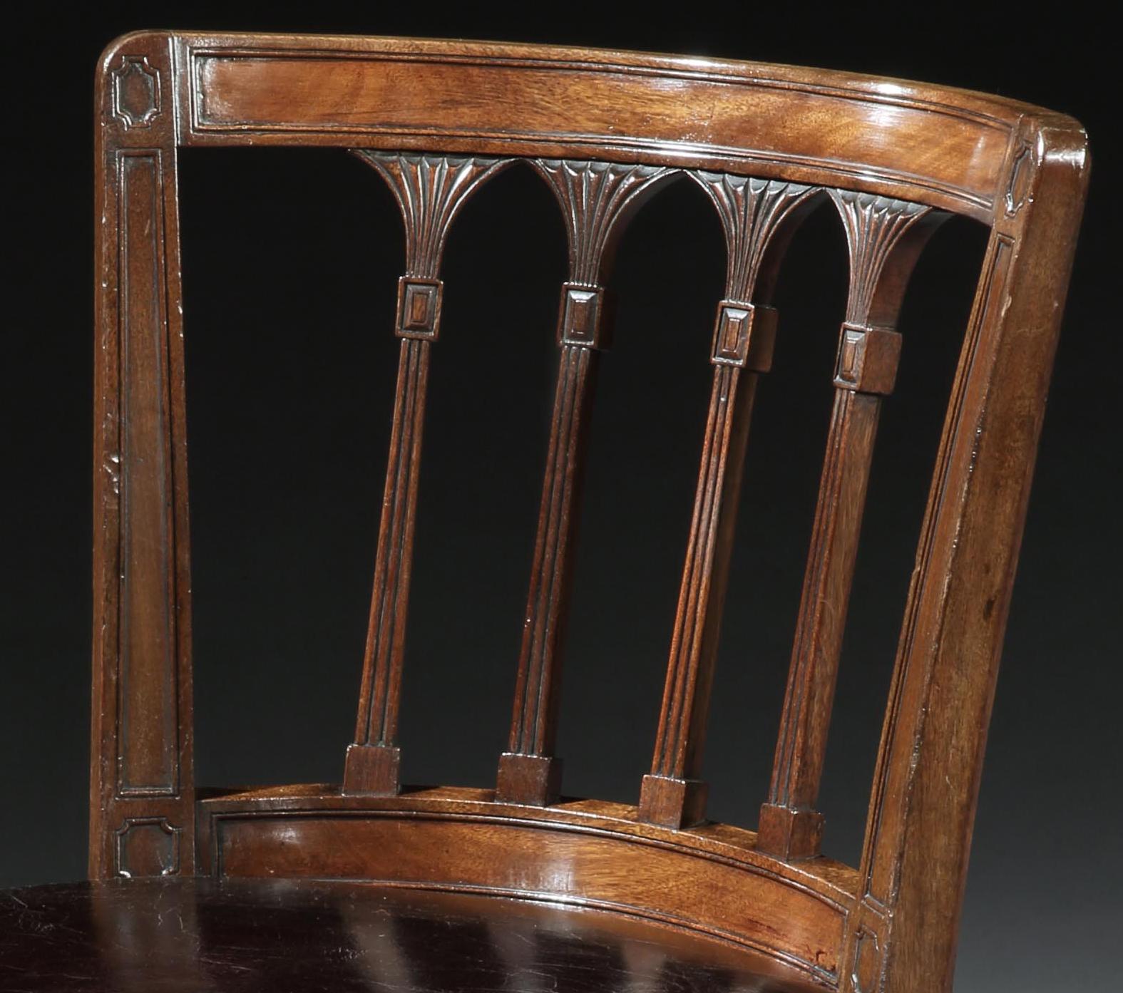 Early 19th Century Set of Twelve English George III Brown Mahogany Library Chairs