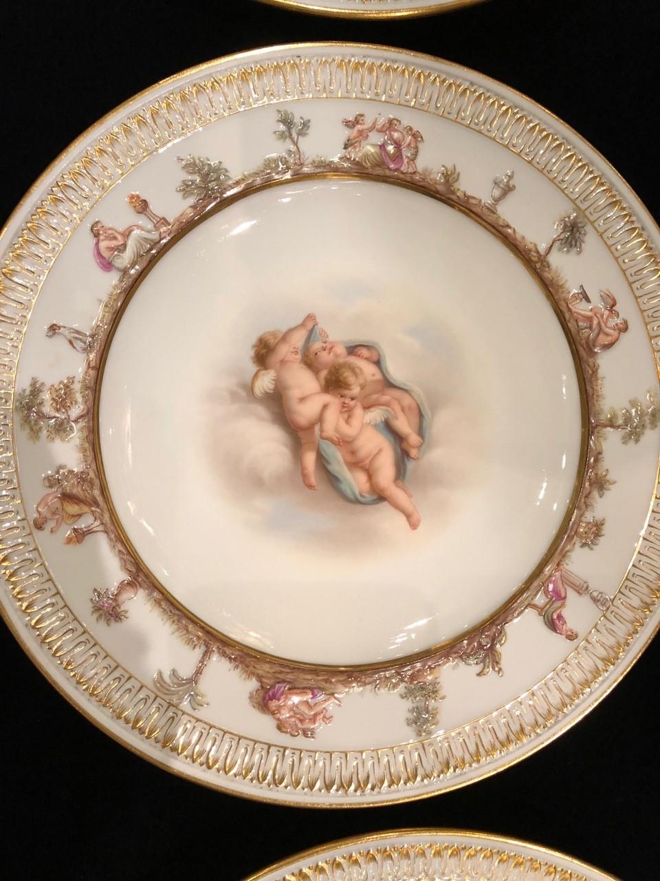 Gilt Set of Twelve Meissen Porcelain Plates with Putti and Heavenly Scenes For Sale