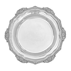 A set of twelve Regency silver dinner plates by Paul Storr
