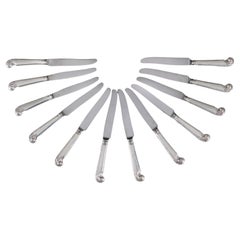 Set von zwölf Pistolengriffen aus Sterlingsilber mit Griff aus Pistolen