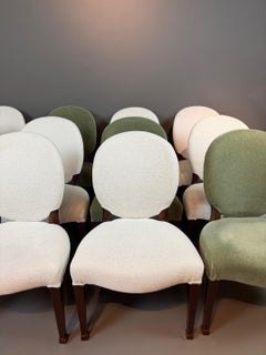 A set of twelve very comfortable mid 20th century Regency Revival dining chairs