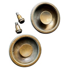 A Set of Two Recessed Bronze Handles
