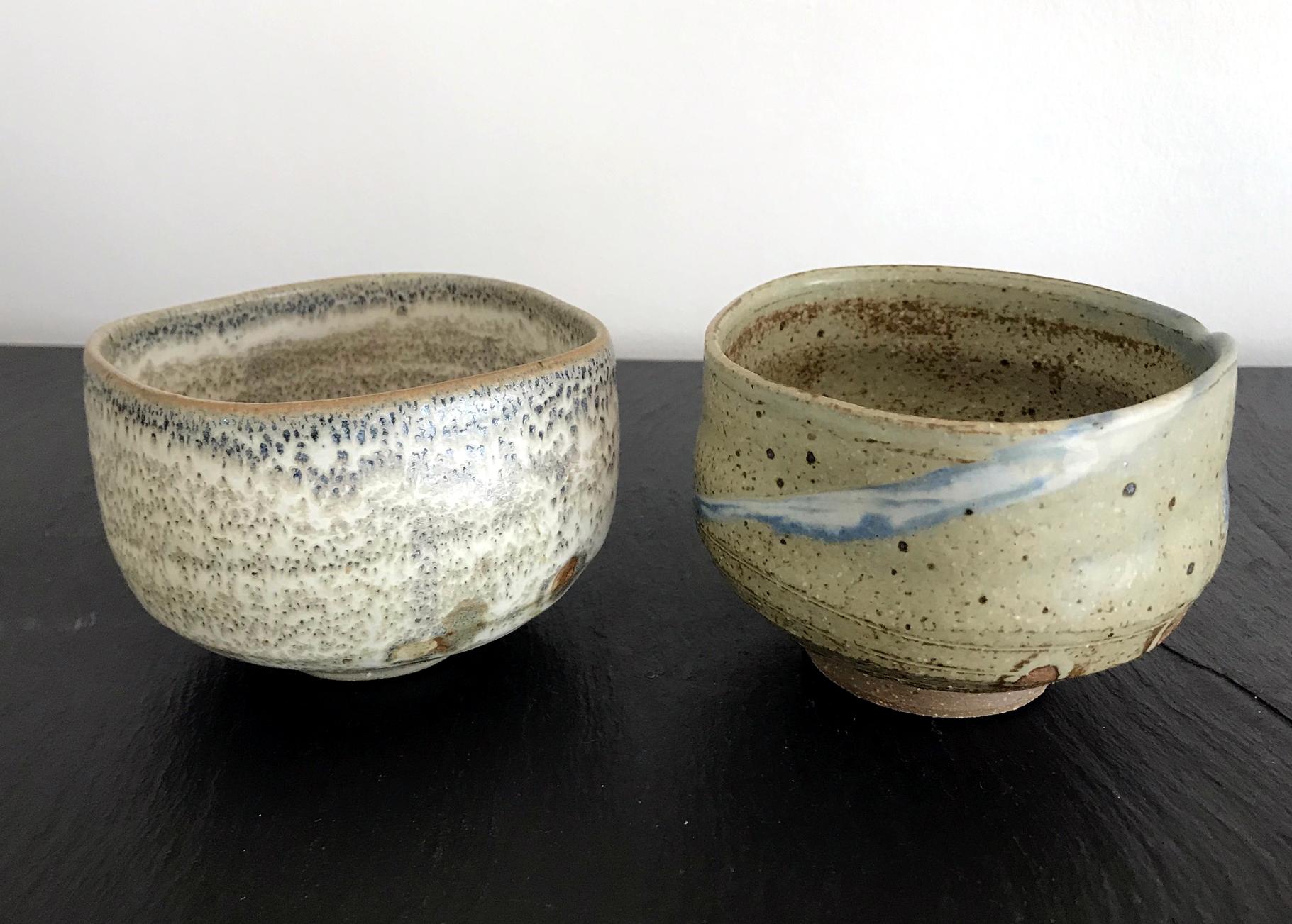 Made by Japanese ceramic artist Makoto Yabe (1947-2005), these two tea blows (known as chawans in Japanese) reflect a deep beauty of Wabi Sabi, a Zen aesthetic that is rooted in the Japanese art and way of living. Transitionally used in the tea