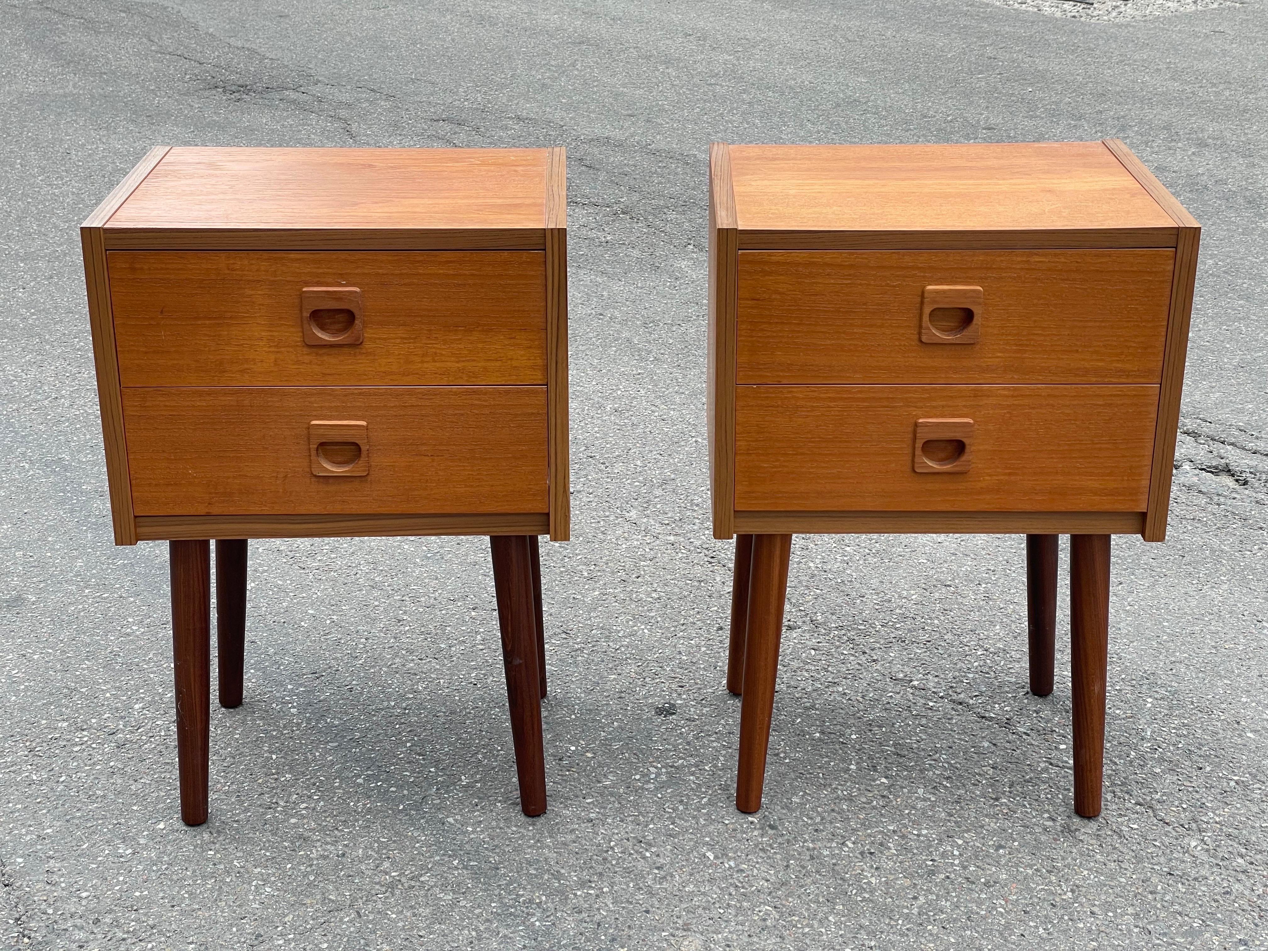 A set of teak nightstands in a beautiful original vintage condition. Simple and light in their expression incorporating the simplistic Mid-Century Modern aesthetics that Danish design was known for.