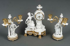 A Sèvres Biscuit and Gilded Bronze Set, 19th Century.