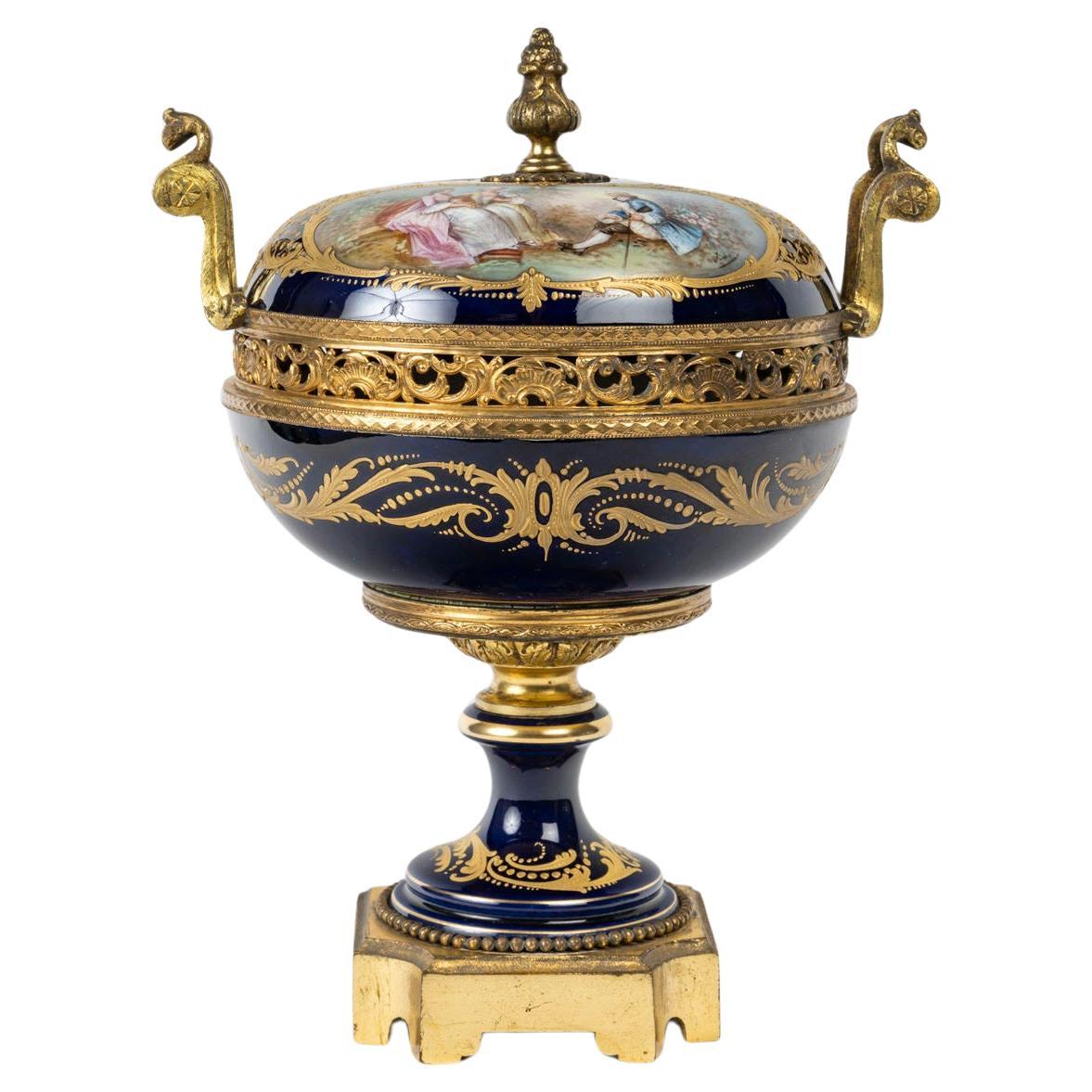 A Sèvres Porcelain and Gilt Bronze Bonbonnière, 19th Century.