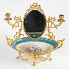 A Sèvres Porcelain and Gilt Bronze Bowl Surmounted by a Mirror, 19th Century.