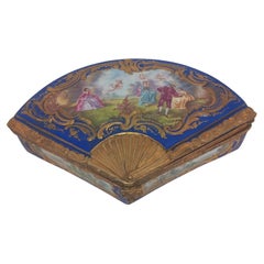 A Sèvres style antique French fan shaped porcelain jewellery box