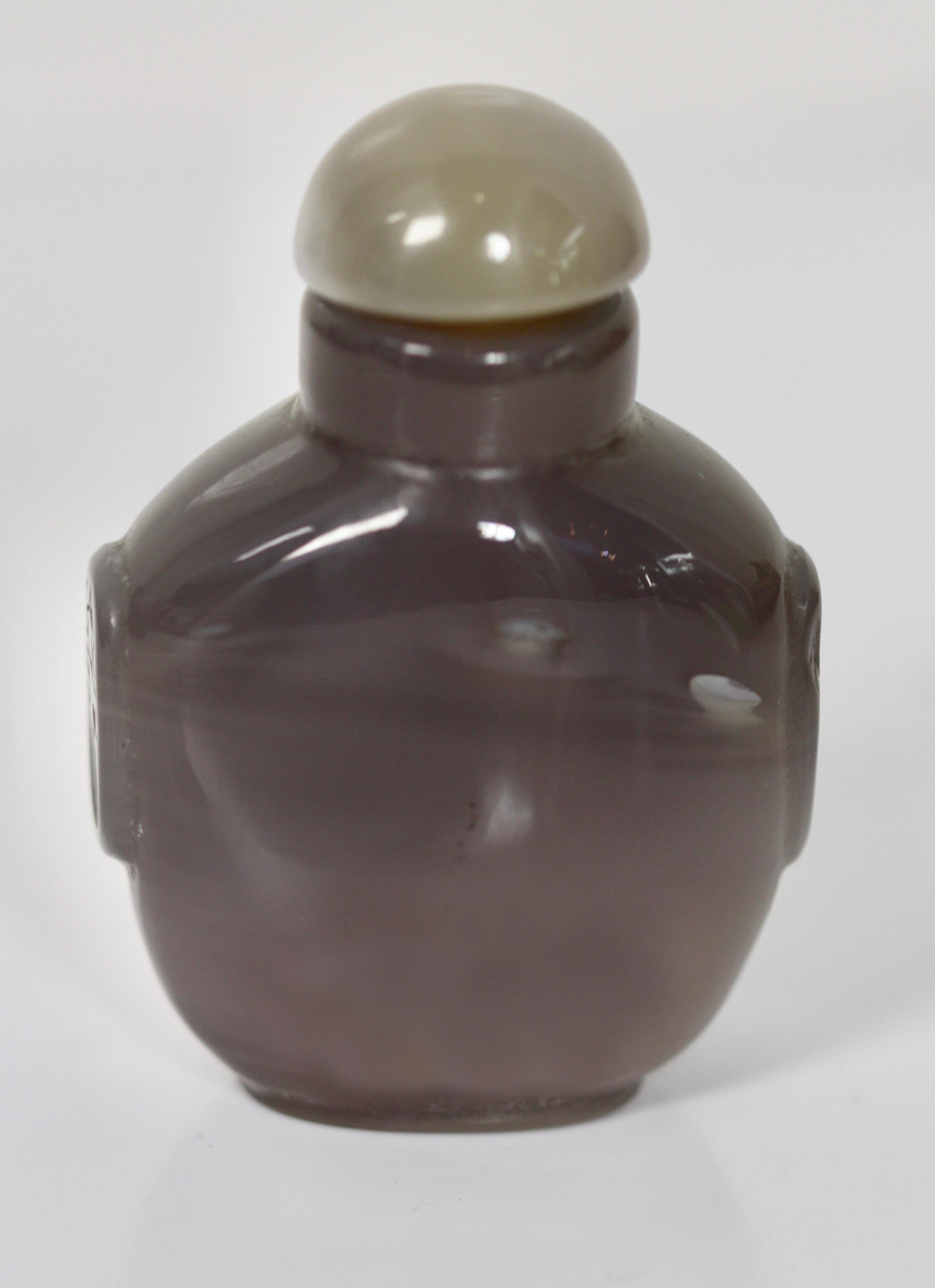 A Shadow Agate 'Horse' Snuff Bottle
Chinese, Qing Dynasty 19th Century, has stopper
6.35 cm, 2 1/2 in.