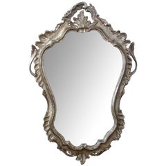 Shapely Venetian Rococo Style Silver-Leafed Giltwood Cartouche-Shaped Mirror