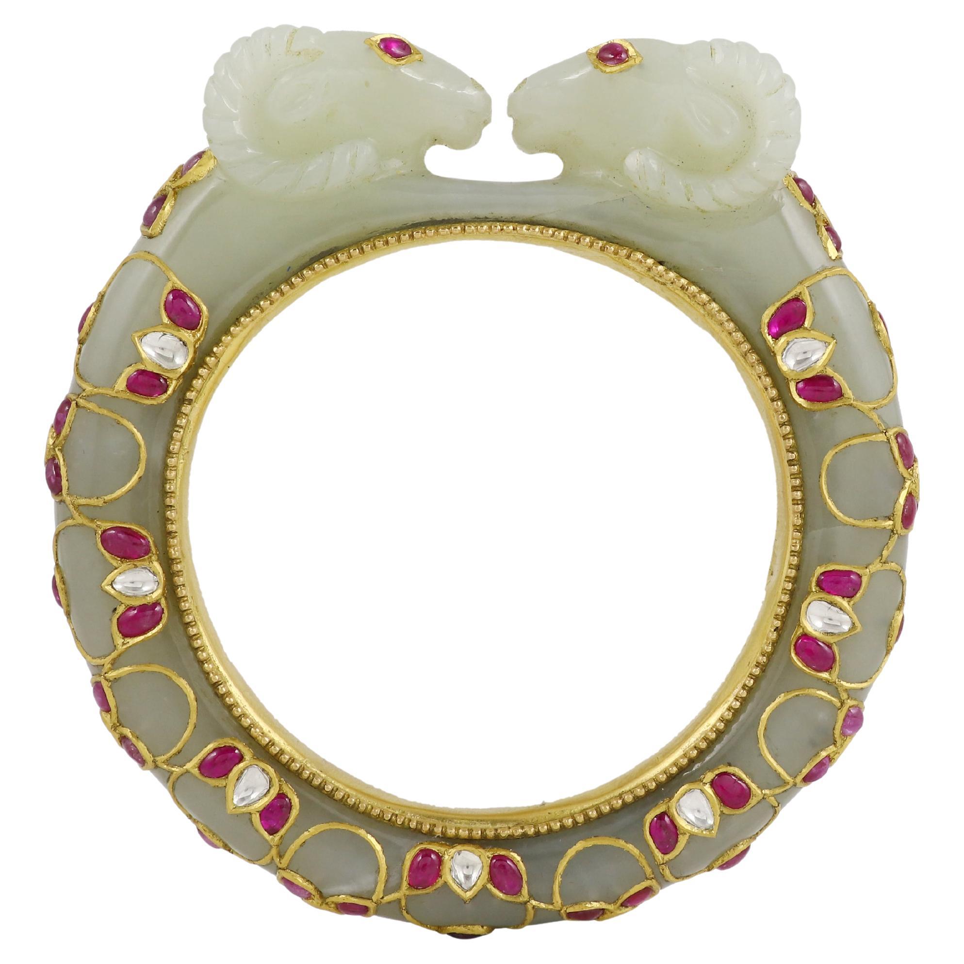 A sheep-head jade bangle in 22K gold rubies & diamond  Jewels from Mughal India