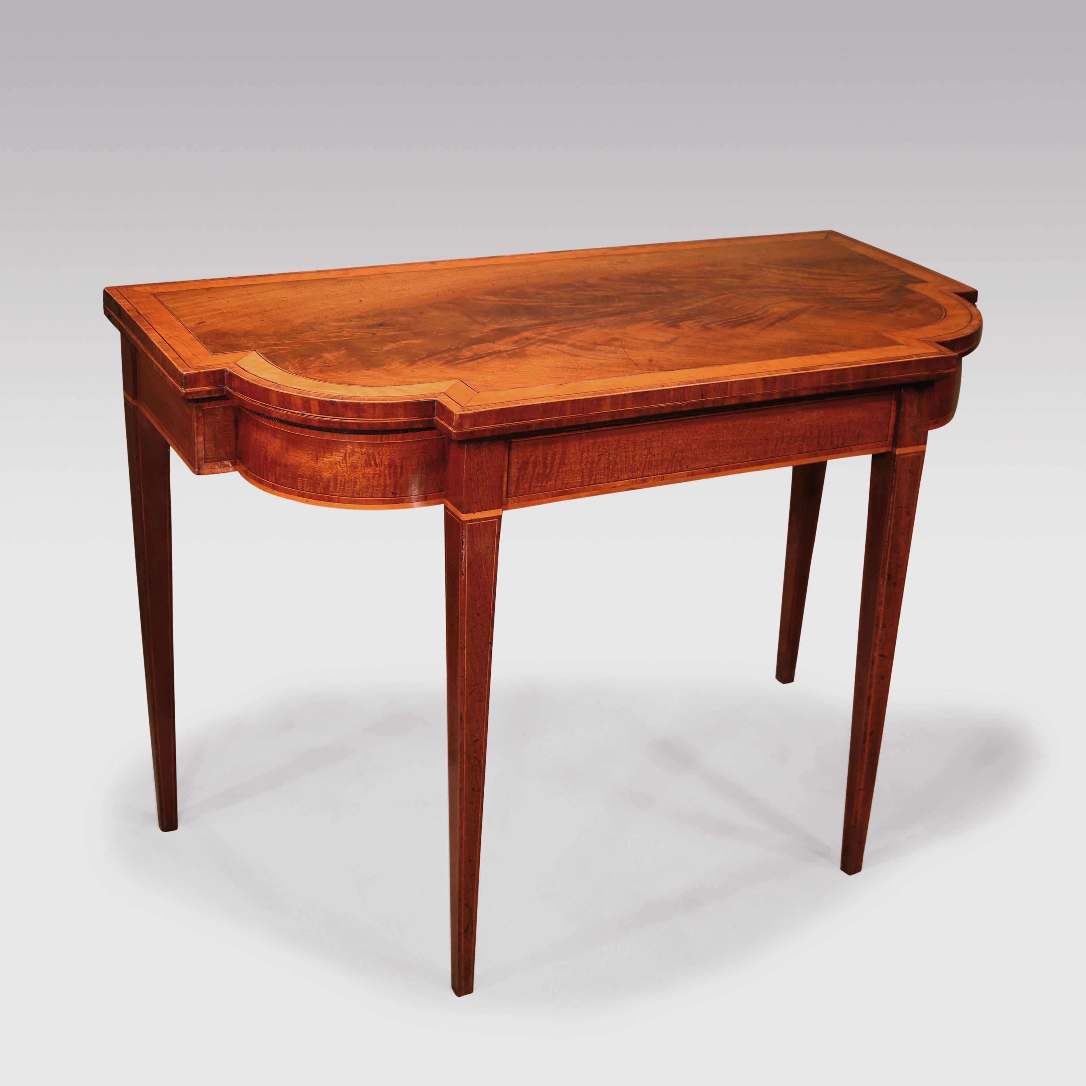 A fine quality late 18th century Sheraton period breakfront mahogany card table, having flame figured satinwood & tulipwood crossbanded top, above fiddleback mahogany frieze supported on boxwood strung square tapering legs.