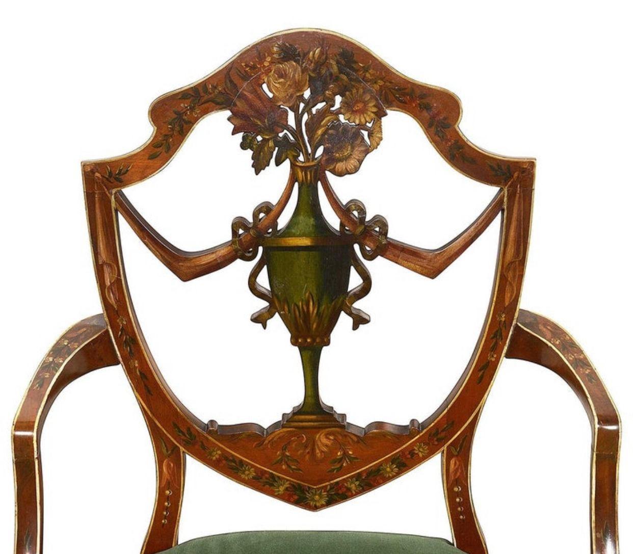 A very good quality Sheraton revival Satinwood hand painted arm chair, with classical urn, floral and ribbon decoration. Velvet upholstered seat and raised on square tapering legs.
