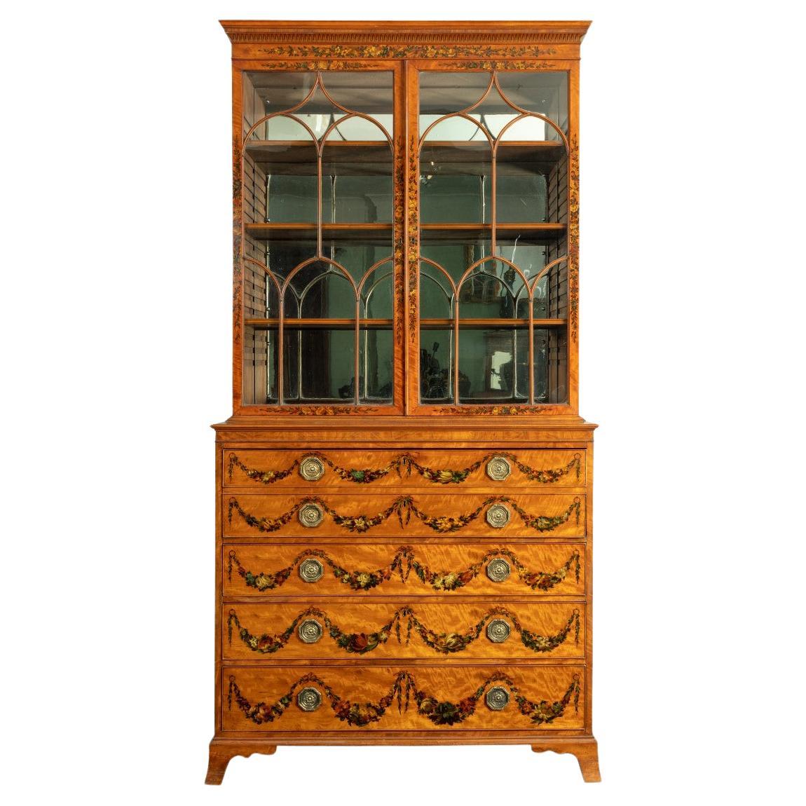 A Sheraton period West Indian satinwood secretaire bookcase