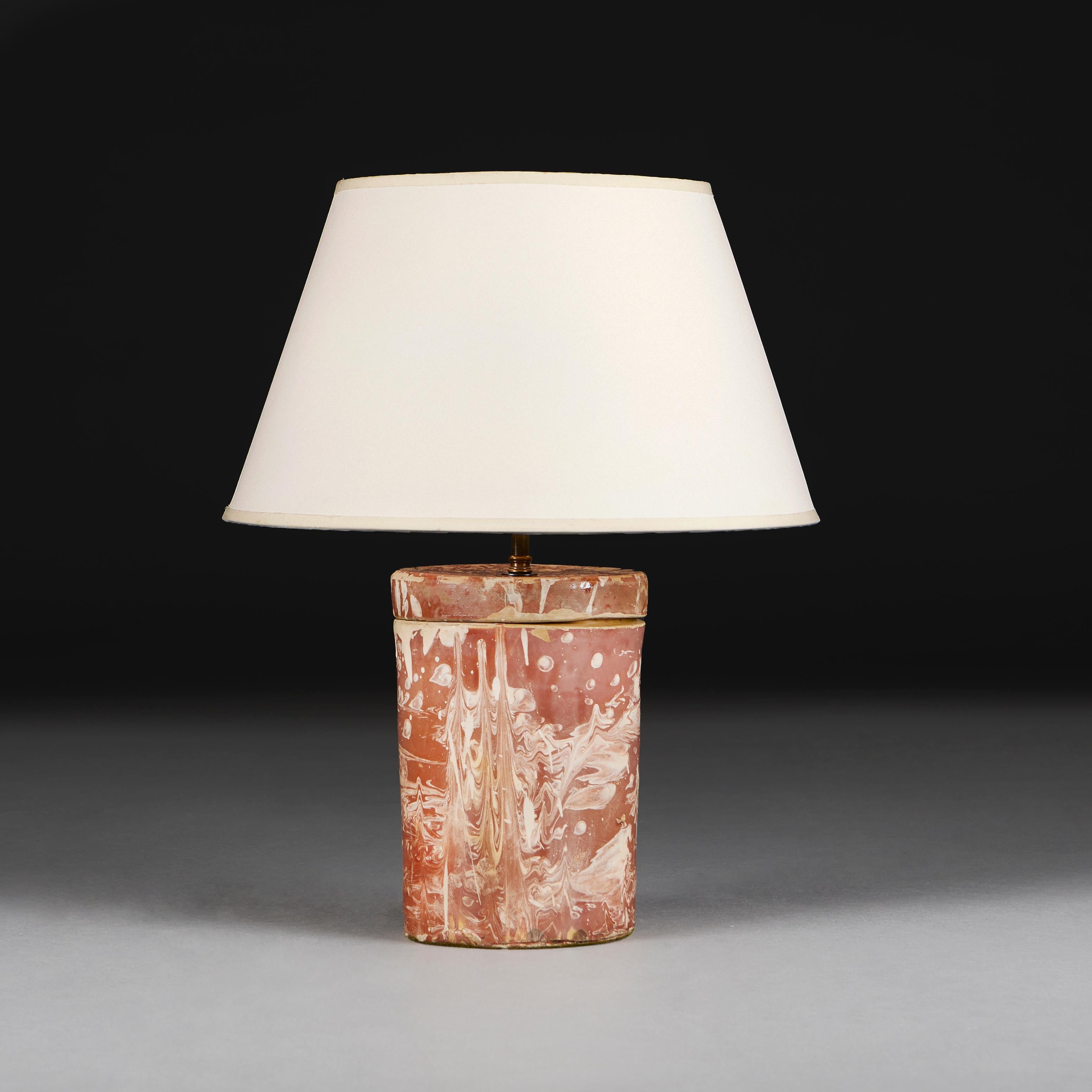An early nineteenth century Sicilian pharmacy jar with lid, with sienna and cream marbleised glaze throughout, now as a lamp.
Sicily, Italy, circa 1820.
Height of vase   25.00cm
Height with shade     50.00cm
Diameter of base     15.00cm

Please