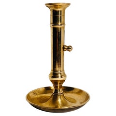 A Side Ejector Brass Chamberstick-England, Late 18th c.