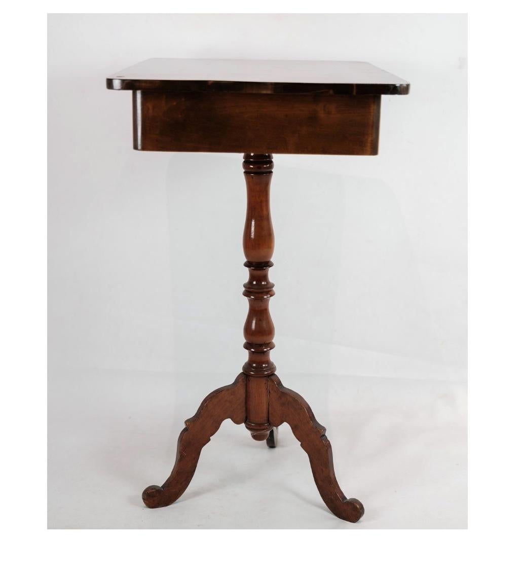 A side table on a mahogany pillar from around the year 1850s. Stands in very nice hand-polished condition.
Dimensions in cm: H: 76.5 W: 59 D: 41.5
Great condition

This product will be inspected thoroughly at our professional workshop by our