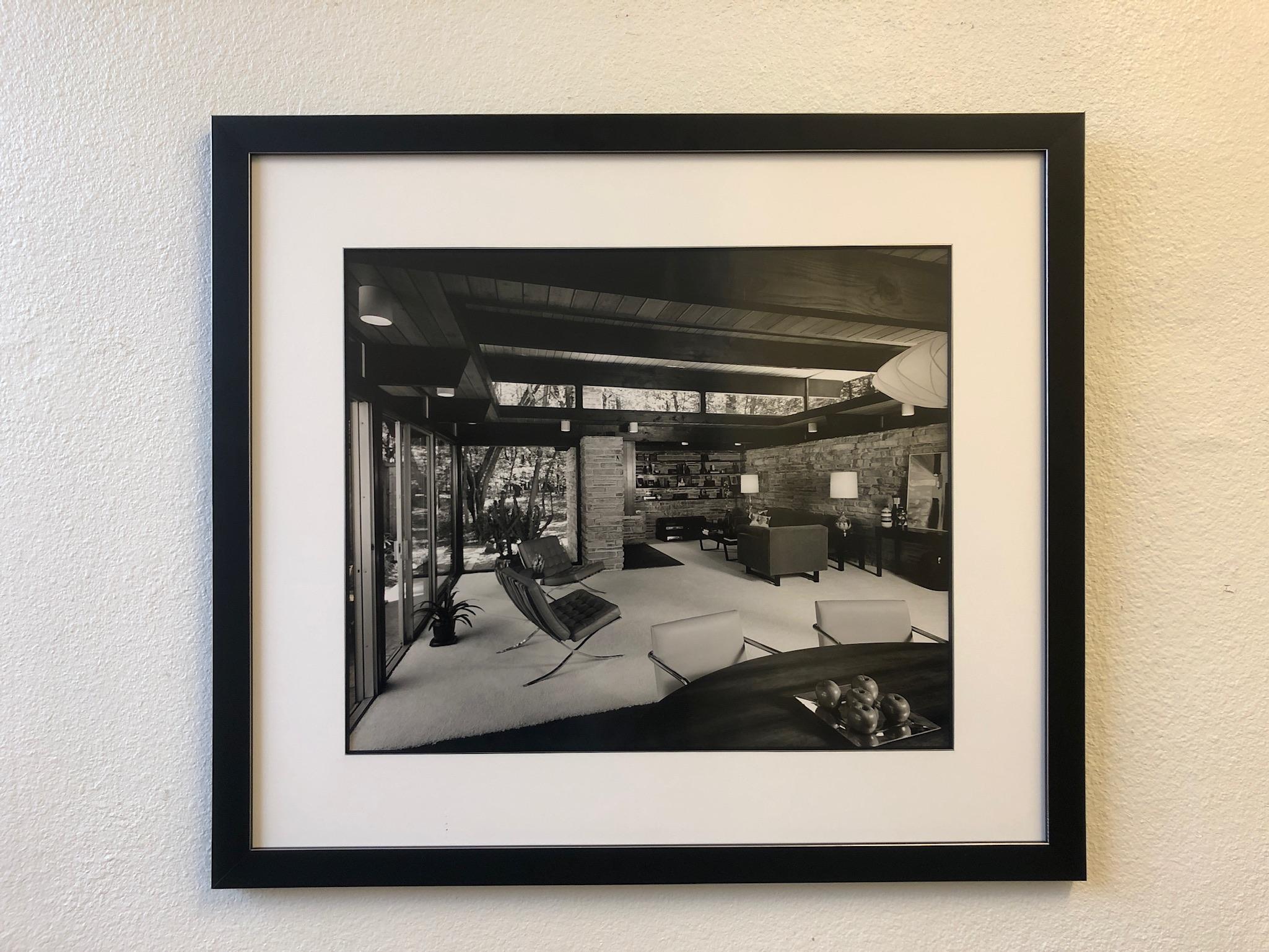 A large signed architectural photograph by Julius Shulman. This is a silver gelatin and its hand signed in the back. The photograph is frame with a black lacquered with silver outline frame and none glare UV protection acrylic. The photo is 24” wide