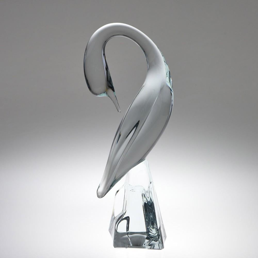 This monumental Daum animal glass sculpture depicts a preening cormorant or an egret. Made in 3 sizes this is the tallest available. 

When Jean Daum assumed control of the Verrerie Sainte-Catherine, after the previous owners defaulted on their
