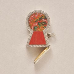 Una scatola di fiammiferi a forma di buco della serratura, in argento e agata