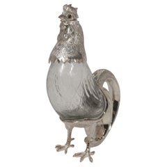 A Silver and Cut Glass Decanter in the Form of a Rooster