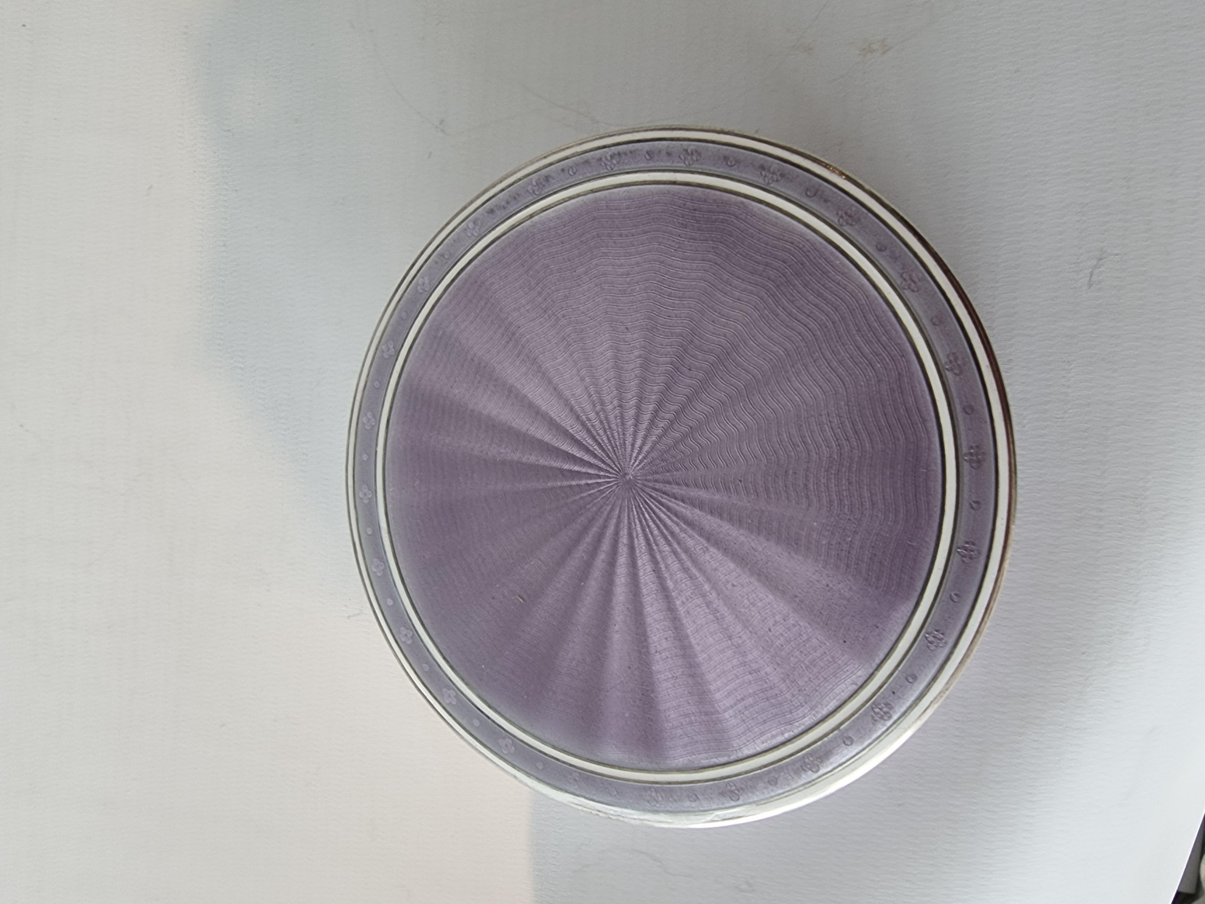 A very fine and pretty silver and purple guilloche enamel, with white enamel border, box. Interior is gilded.