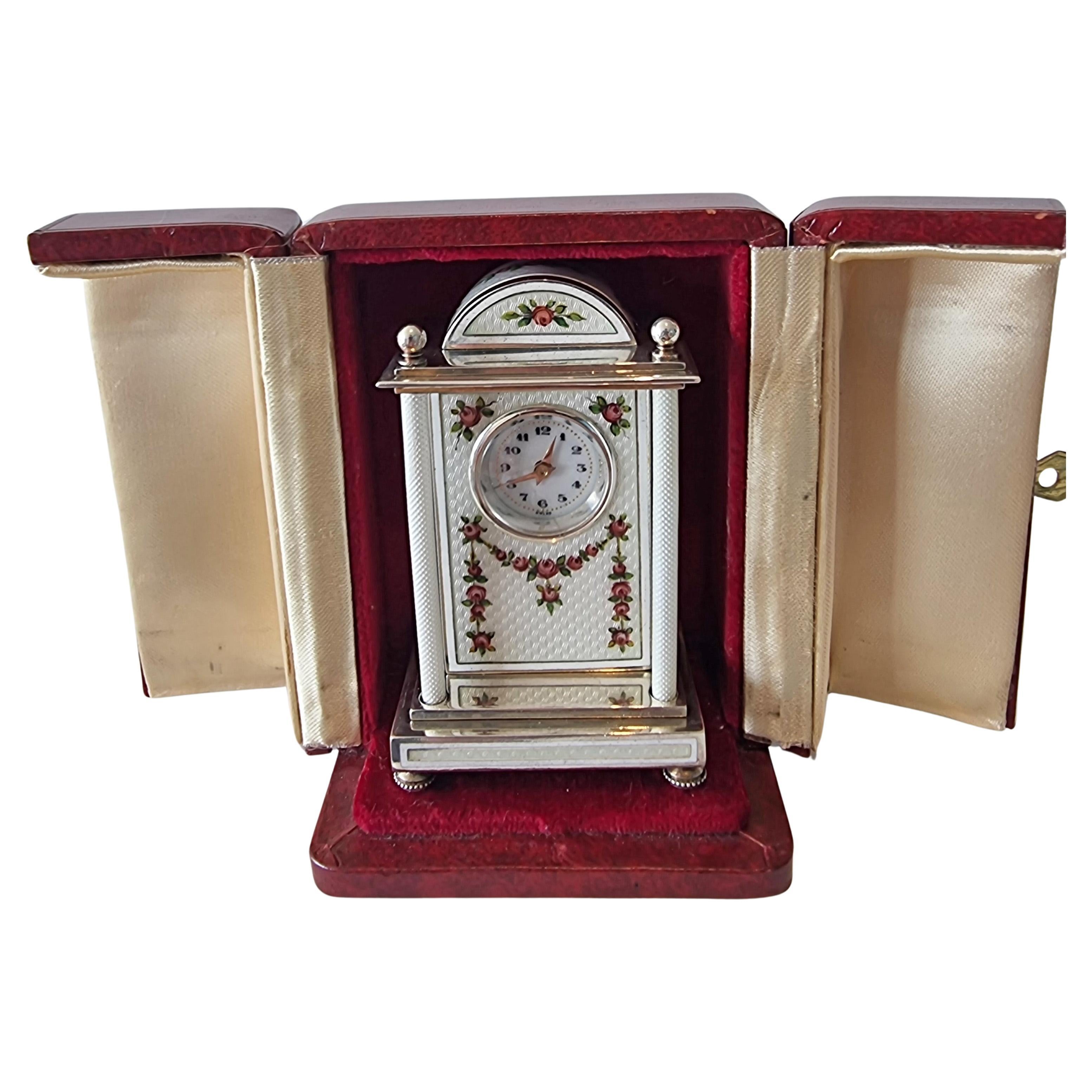 A Silver and White Guilloche enamel Carriage or boudoir Clock
