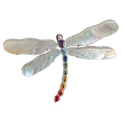 A Silver Dragonfly Brooch/Pendant set with Sapphires