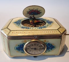 A silver gilt and Imperial Yellow guilloche enamel singing bird box