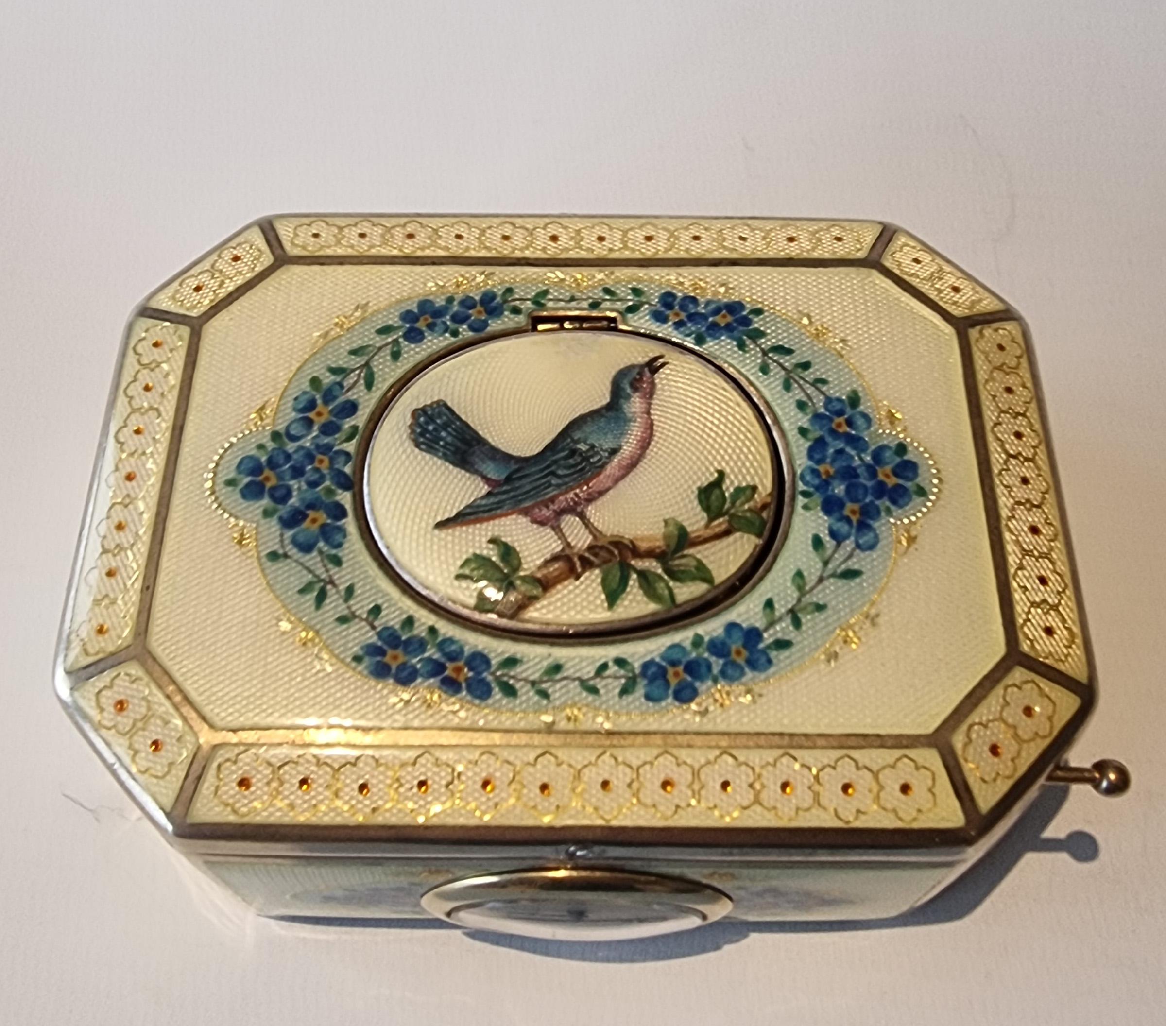 Swiss A silver gilt and Imperial Yellow guilloche enamel singing bird box For Sale