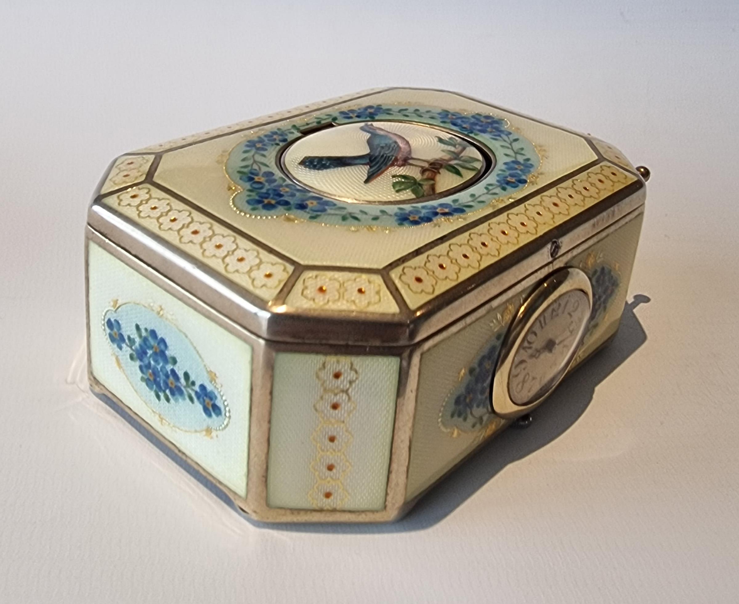 Early 20th Century A silver gilt and Imperial Yellow guilloche enamel singing bird box For Sale