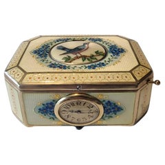A silver gilt and Imperial Yellow guilloche enamel singing bird box