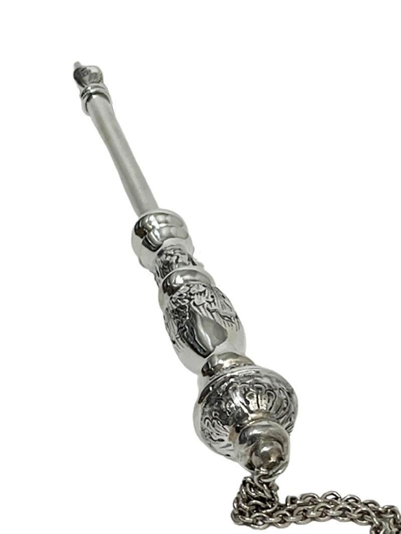 A silver Jewish Torah pointer or Yad

A silver yad is a Jewish ritual pointer, known as a Torah pointer, used by the reader to follow the text during the Torah reading from the parchment Torah scrolls. The Torah pointer attached to a silver chain. 