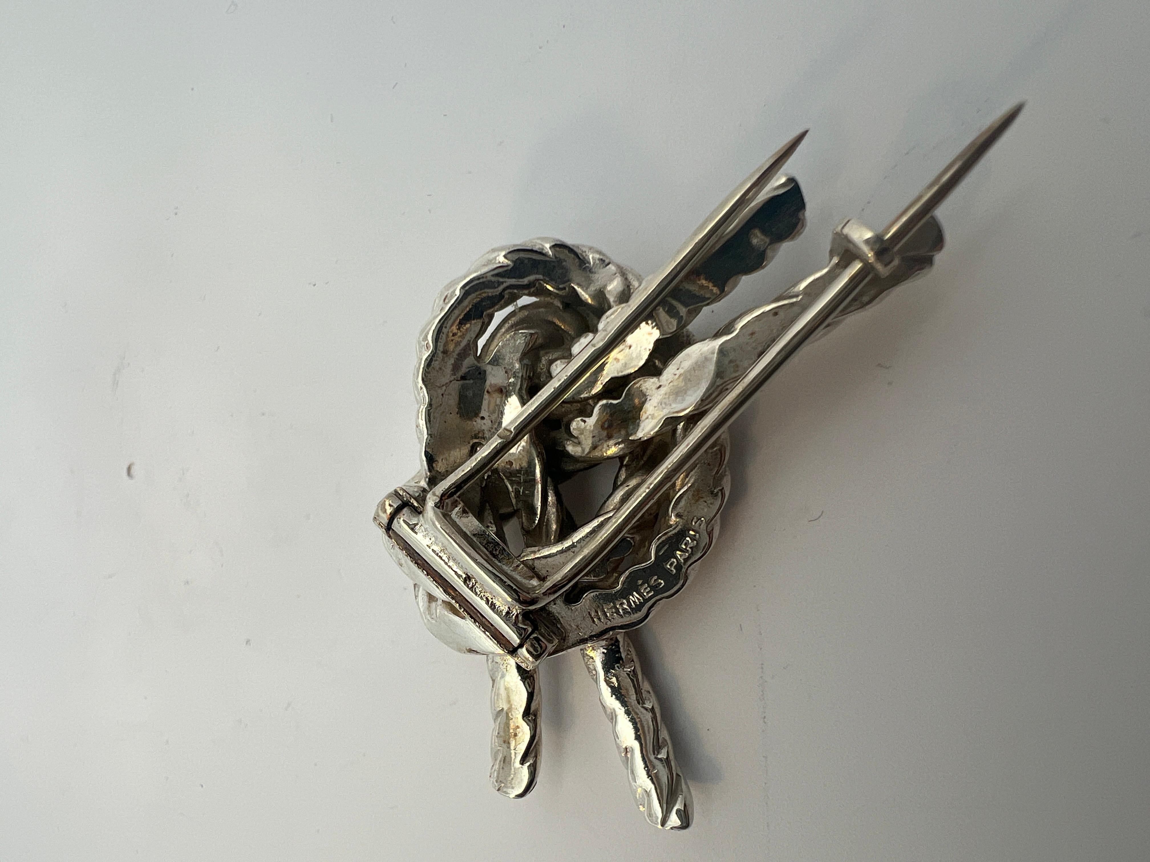A silver knot brooch by Hermès For Sale 6
