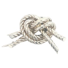 Broche à nœud en argent de la maison Hermès