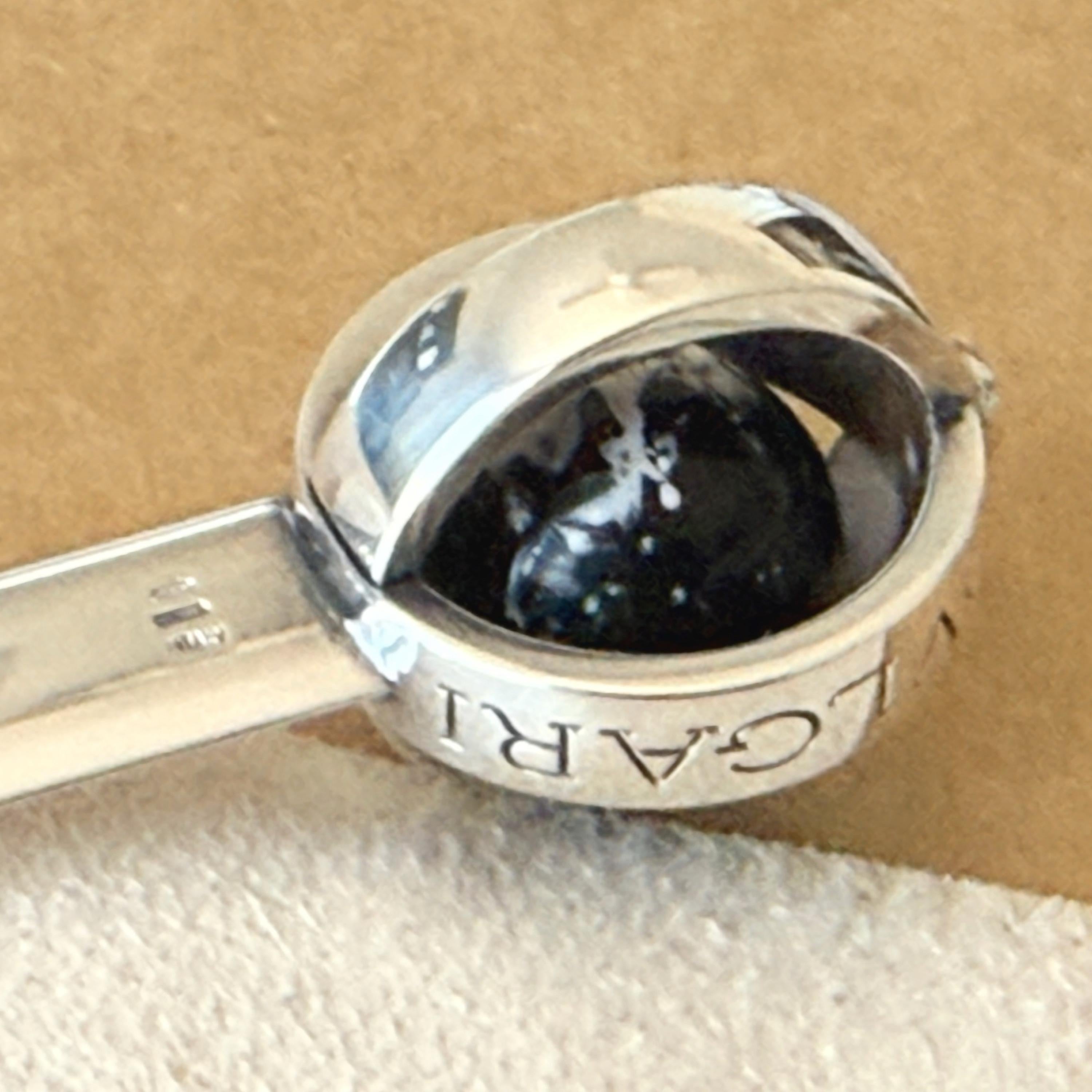 Un superbe coupe-papier en argent de Bulgari, orné d'une boule d'onyx dans une cage, Italie, 20e siècle. Il mesure environ 6 pouces de long, le design de la cage est d'environ 1 pouce de diamètre.  Estampillé avec tous les tampons Bulgari appropriés