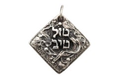 A Silver Mazel Tov Pendant , Henryk Winograd, Judaica, New York, 20th Century