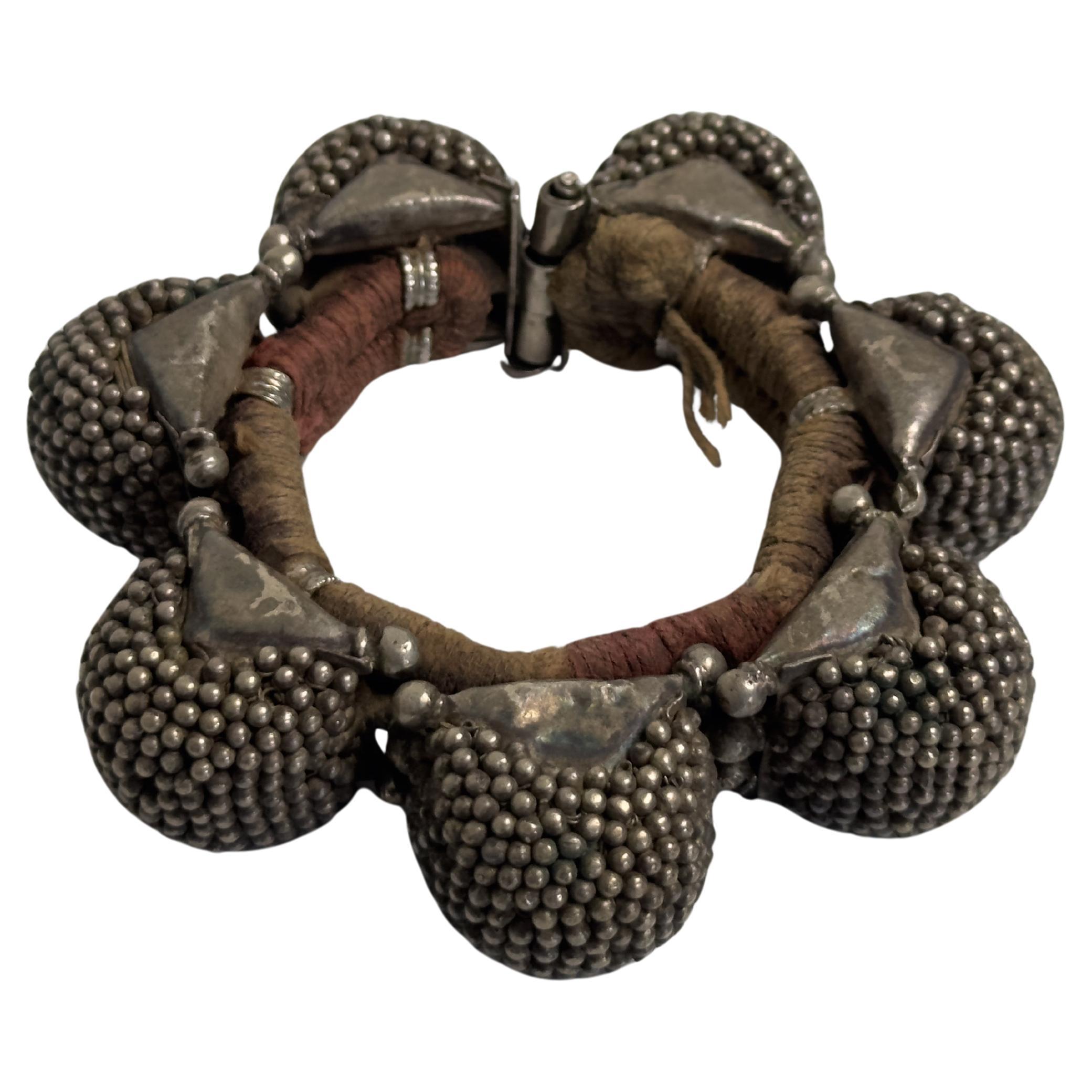A silver 'naugari' bracelet For Sale