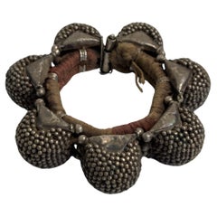 A silver 'naugari' bracelet