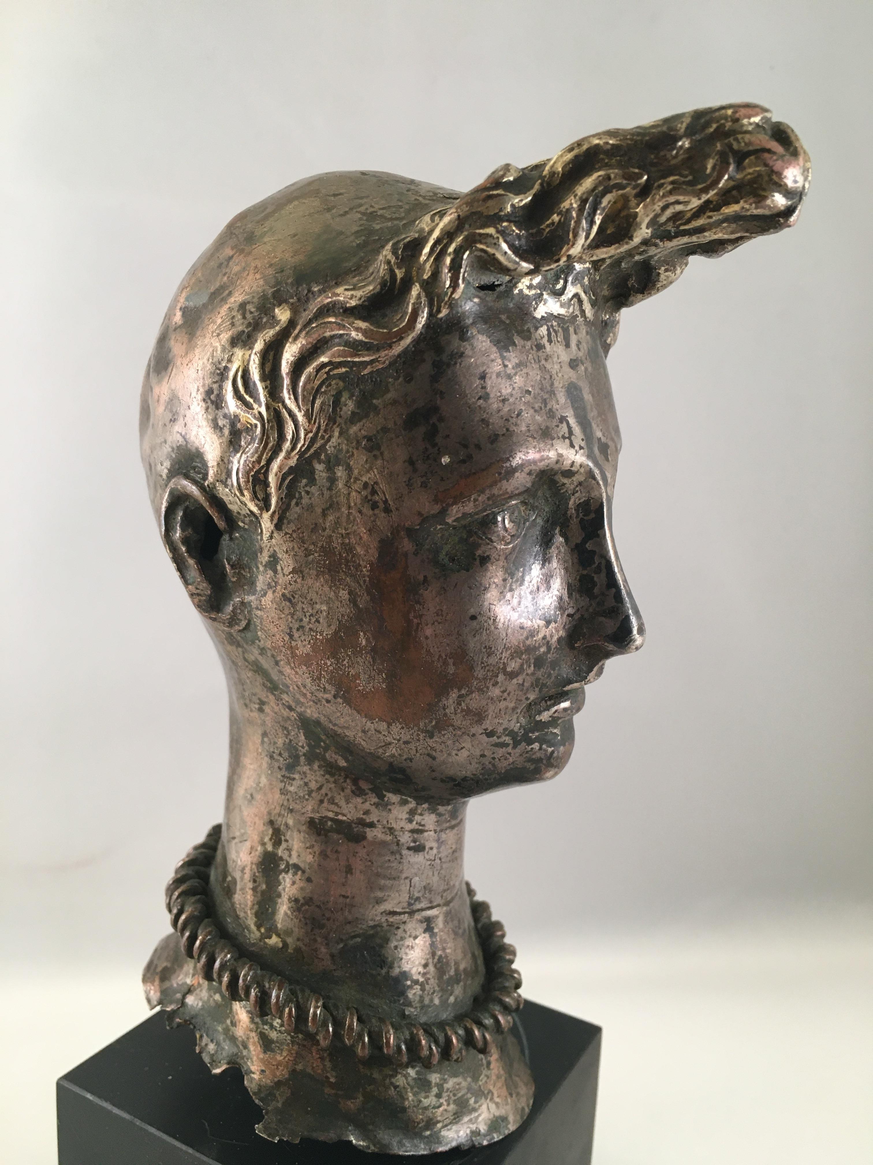A silver plated head of 