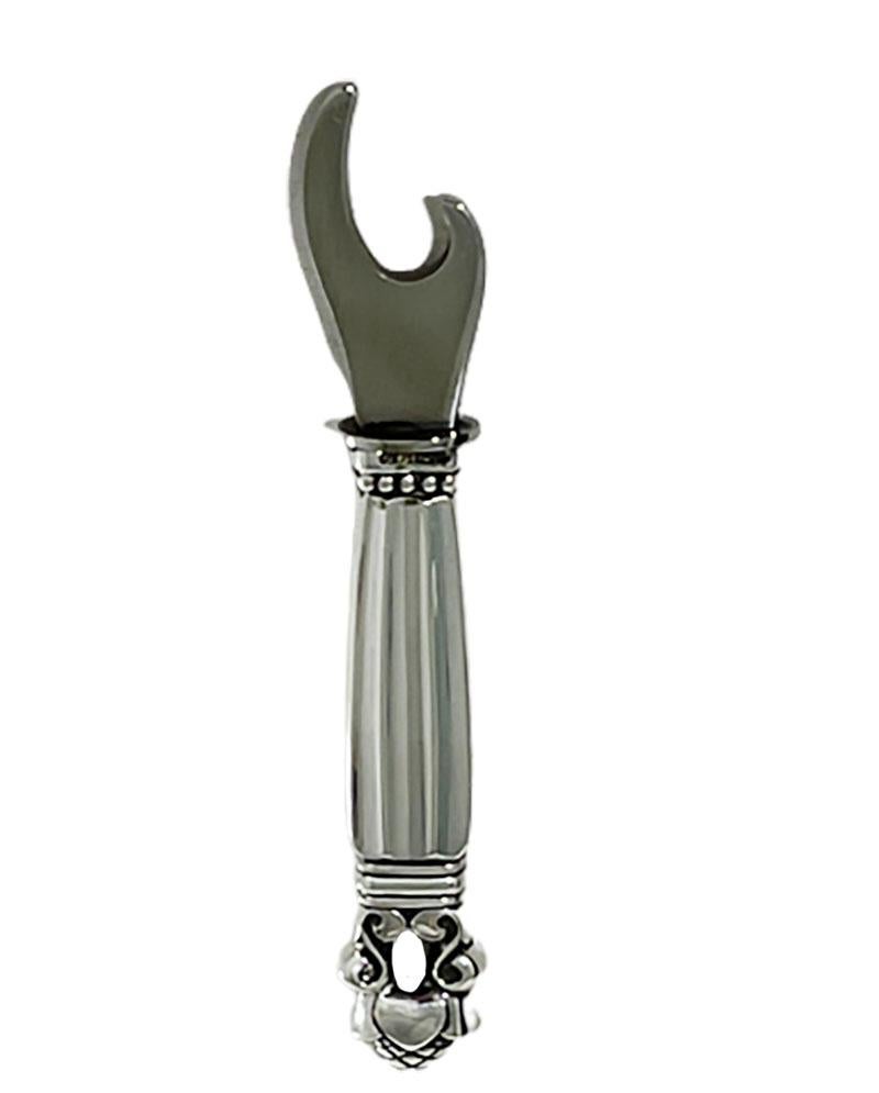 A silver pocket travel bottle opener in leather pouch by Georg Jensen, 1915-1919

A silver pocket travel bottle opener in the Acorn pattern, made by Georg Jensen, Denmark. The opener has the silver hallmarks of George Jensen, in oval with beads