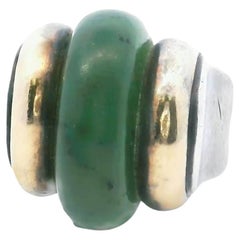 Une bague en argent et une bague en jade. Puiforcat. Art déco.