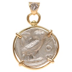A Silver Tetradrachm Owl with Diamond & 18 karat gold (pendant only)