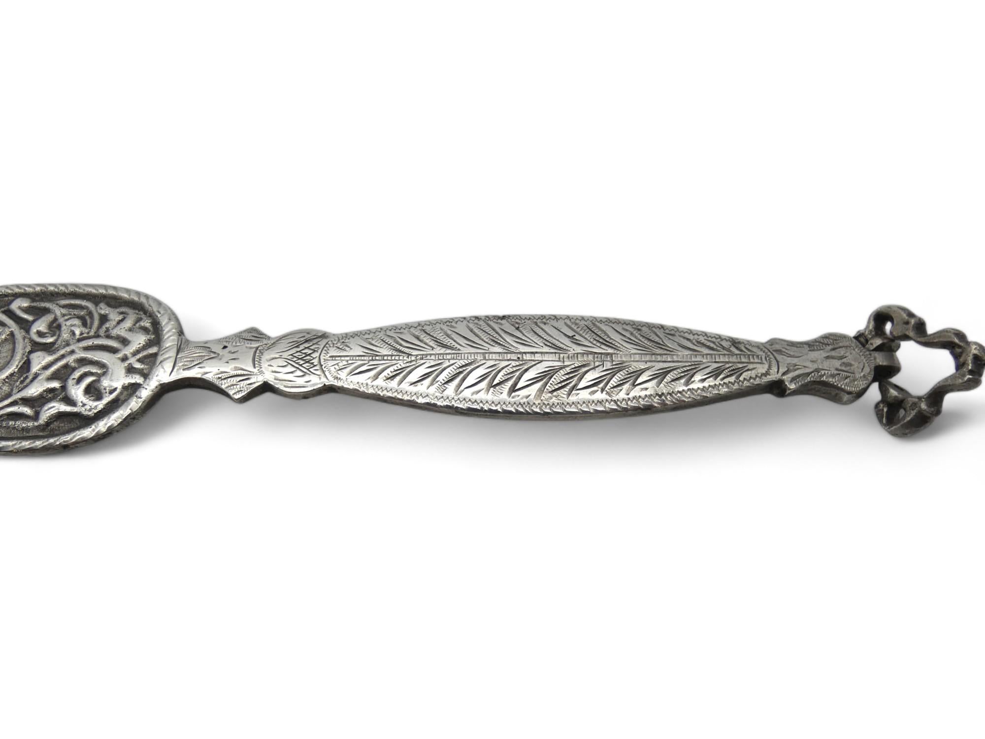 An Exquisite Silver Torah Pointer, made in Morocco in 1931.

Torah pointer is yet another piece of Sephardic Judaica that was artistically made in Morroco in the early 20th century.

The first part of the handle of the Pointer is oval and quatrefoil