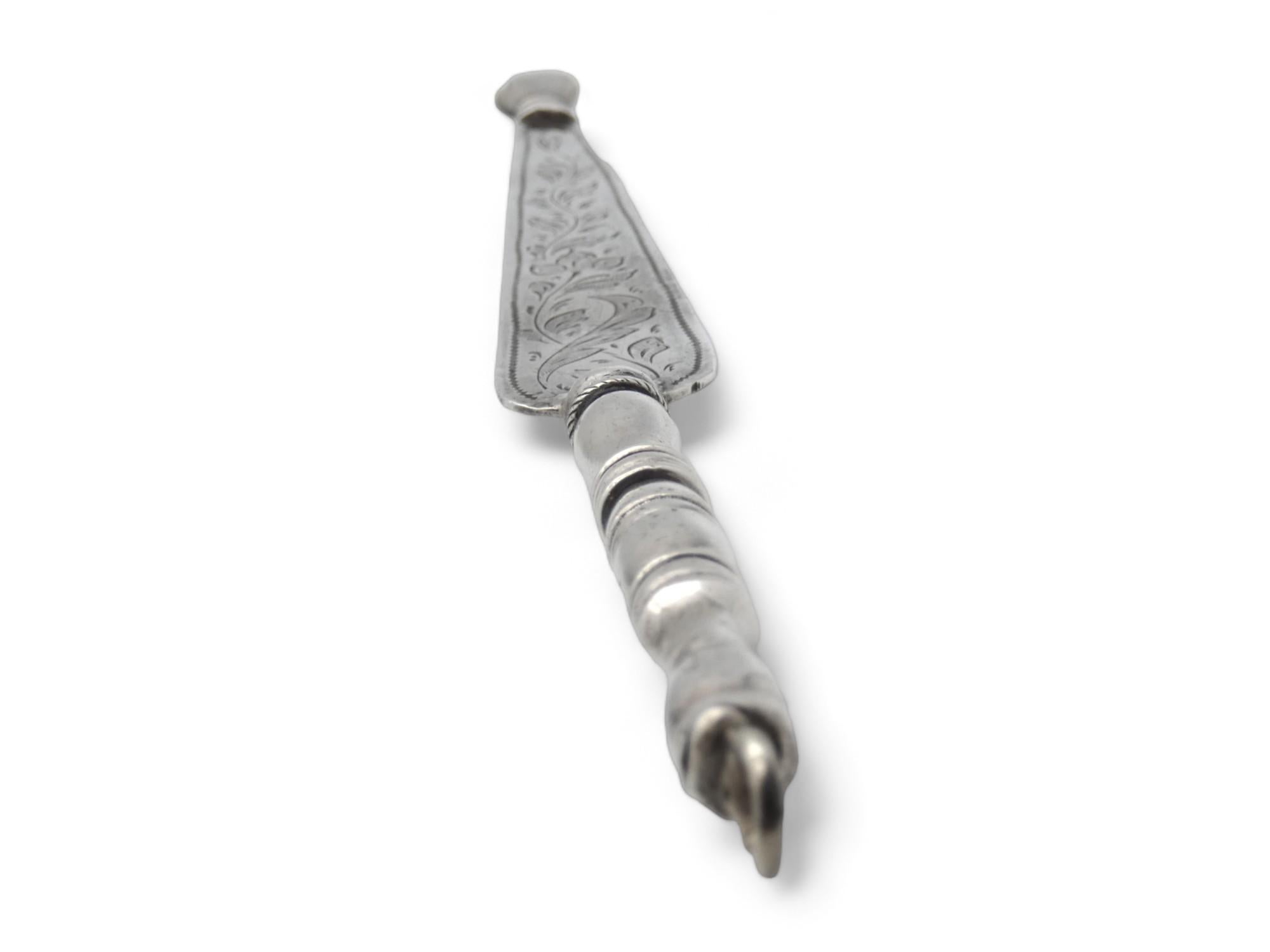 A Beautifully Engraved Silver Torah Pointer, made in Morocco, Circa 1900.

This dedicated Torah pointer is one of the many pieces of Judaica from the Sephardic Jewry that was present in Morocco at the turn of the twentieth century.

Pointer has a